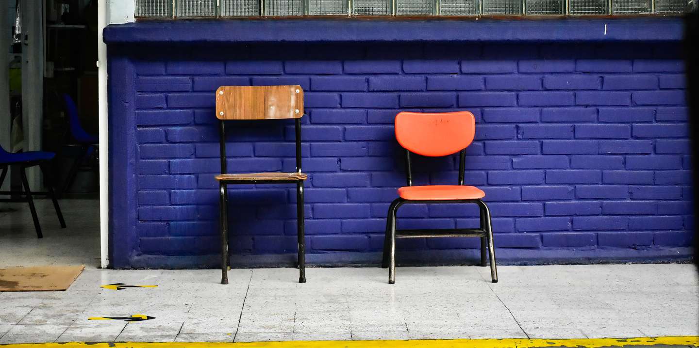 Empty chairs seen outside a classroom.Schools in Mexico