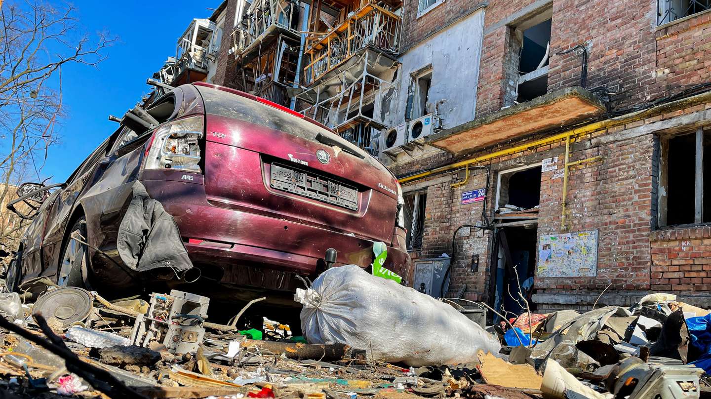 A car and residential building were destroyed following a