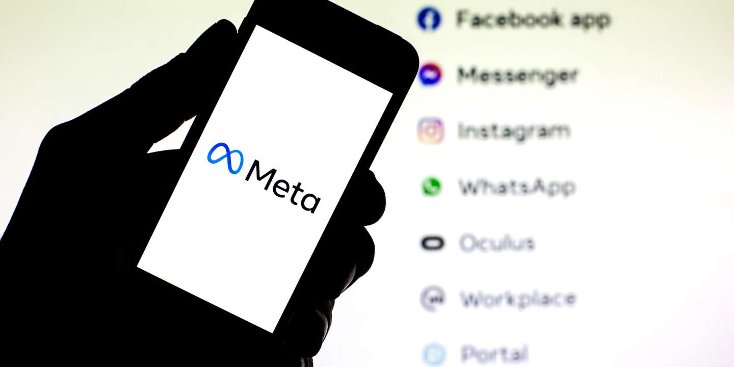 In this photo illustration a Meta logo seen displayed on a