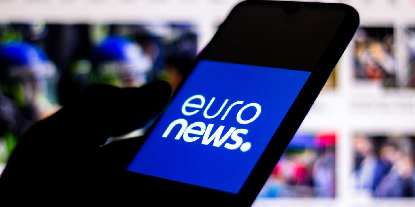 In this photo illustration the Euronews logo seen displayed