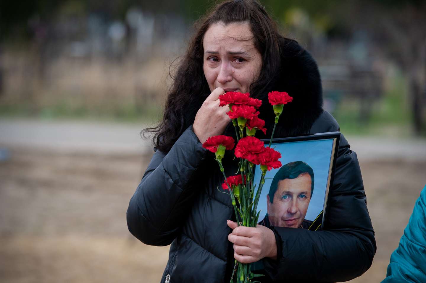 Ukrainian Family Buries Patriarch Killed By Russian Military At Irpin Cemetery