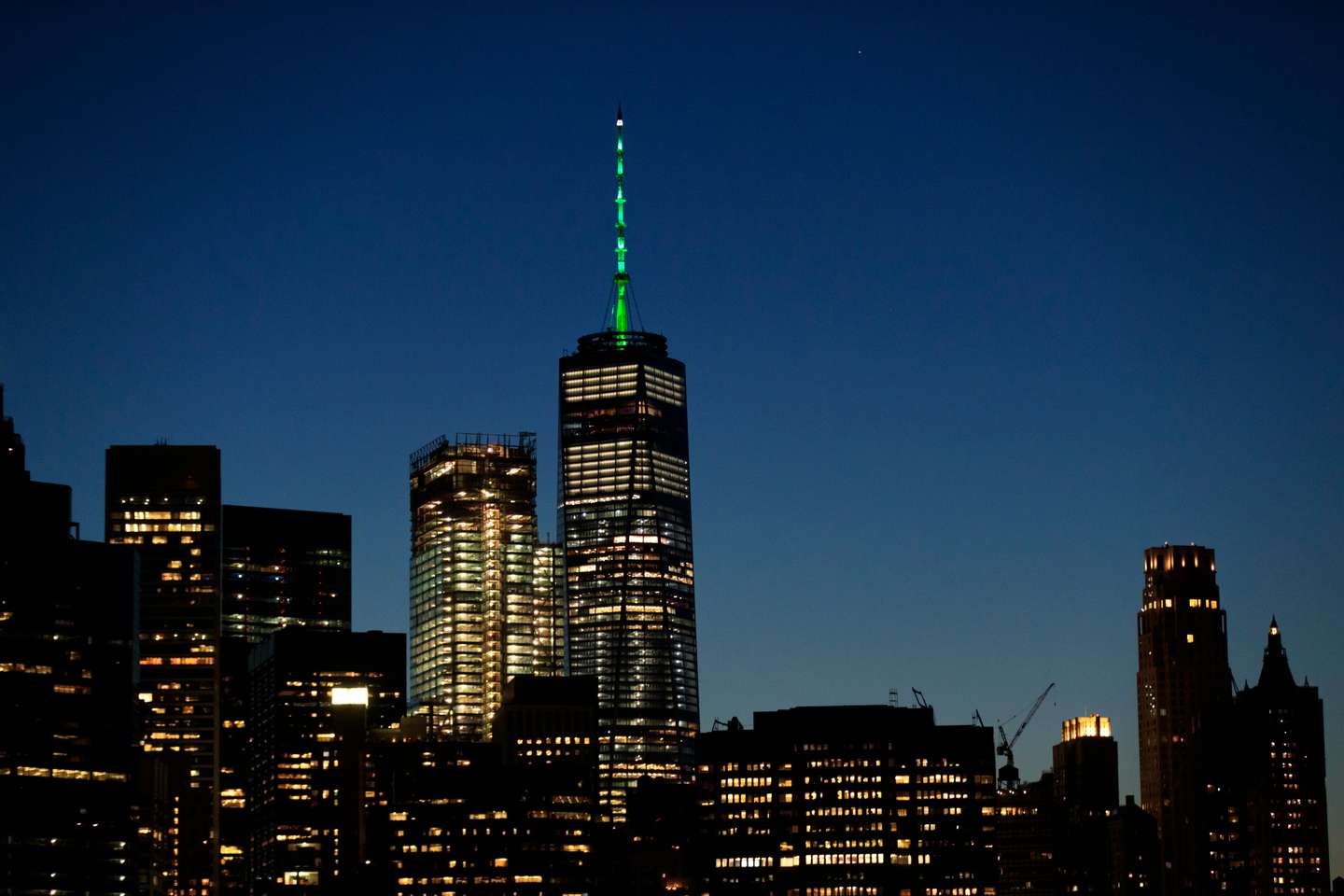 NYC's One World Trade Illuminated In Green In Support Of Paris Climate Accord