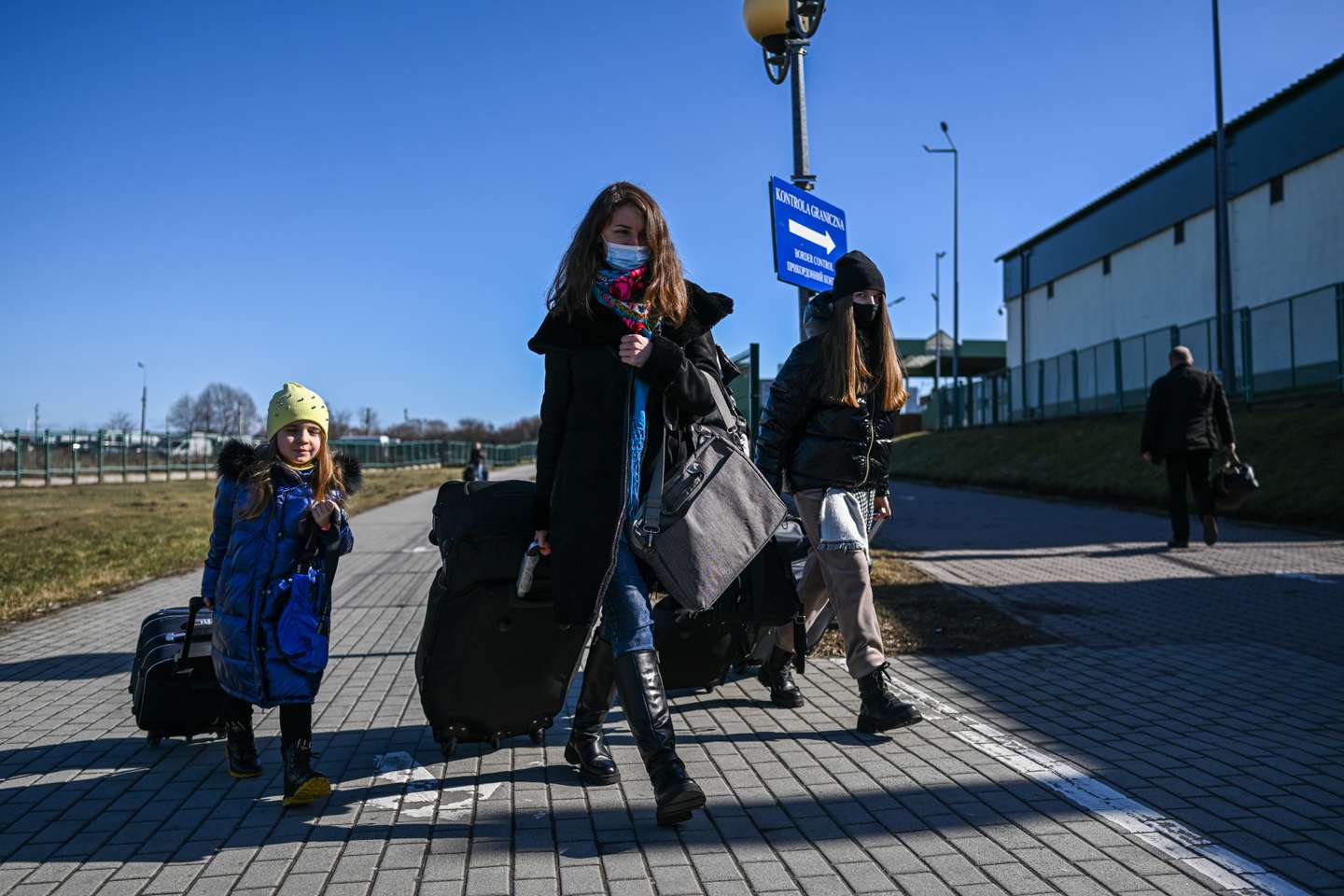 Ukrainians Flee To Poland Amid Russia's Armed Invasion