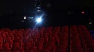 epa08481110 A man wearing a mask watch a movie at Capitol cinema, which reopened his doors after three months, in Madrid, Spain, 12 June 2020. Madrid cinemas resume business are lockdown restrictions are eased amid the ongoing pandemic of the COVID-19 disease caused by the SARS-CoV-2 coronavirus.  EPA/KIKO HUESCA