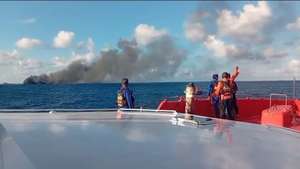 epa13162504 A handout photo made available by the National Search and Rescue Agency of Indonesia (BASARNAS) shows thick smoke billowing from a burning ferry in the waters off Lombok Island, West Nusa Tenggara Province, Indonesia, 12 August 2026. According to BASARNAS, passanger ferry KMP Putri Yasmin bound for Lembar, Lombok Island from Padangbai, Bali Island, caught fire in the waters off Lombok Island early in the morning of 12 August 2026.  EPA/BASARNAS / HANDOUT  HANDOUT EDITORIAL USE ONLY/NO SALES