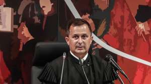 epa09124510 The juge Ivo Rosa reads the instructional decision of the high-profile corruption case known as Operation Marques, at the Justice Campus in Lisbon, Portugal, 09 April 2021. Operation Marques has 28 defendants - 19 people and 9 companies - including former Prime Minister Jose Socrates, banker Ricardo Salgado, businessman and friend of Socrates Carlos Santos Silva, and senior executives of Portugal Telecom, and is related to crimes of active and passive corruption, money laundering, document forgery, and tax fraud.  EPA/MARIO CRUZ / POOL