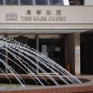 epa13253480 A security guard stands outside the High Court before the murder trial over the 2023 killing of Hong Kong model and socialite Abby Choi in Hong Kong, China, 21 September 2026. Choi’s former husband, Kwong Kong-chi (Alex Kwong), his father Kwong Kau and his brother Kwong Kong-kit (Anthony Kwong) are charged with murder and preventing the lawful burial of a body.  EPA/MAY JAMES