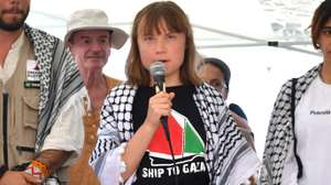 epa12149124 Swedish climate activist Greta Thunberg (C) speaks during a press conference together with the crew of the Madleen, the sailing ship of the NGO Freedom Flotilla, before departing from the port of San Giovanni Li Cuti headed to Gaza, in Catania, Italy, 01 June 2025.  EPA/ORIETTA SCARDINO