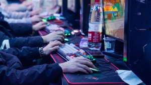epa11096315 People play video games at an internet cafe in Beijing, China, 22 January 2024. The new rules on online gaming in China, which require game developers to cap how much players can recharge their accounts, and encourage excessive gaming by offering rewards, are due for public comment by 22 January 2024.  EPA/WU HAO