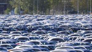 epa12909845 Cars for export wait for shipment at the port in Emden, Germany, 23 April 2026. Autoport Emden is the third-largest automobile handling port in Europe, with an annual handling volume of around 1.24 million vehicles, mainly brands from the Volkswagen Group including VW, Audi, Porsche, Bentley and Lamborghini.  EPA/CHRISTOPHER NEUNDORF