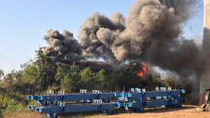 epa12647880 A handout photo made available by the State Railway of Thailand (SRT) shows smoke billowing from the wreckage of a passenger train after a construction crane collapsed onto it in Sikhio district, Nakhon Ratchasima, Thailand, 14 January 2026. At least 22 people were killed and more than 79 others injured when the crane fell on the Special Express No. 21 train traveling from Bangkok to Ubon Ratchathani, according to local police. Thai Deputy Prime Minister and Minister of Transport Phiphat Ratchakitprakarn confirmed there were 195 passengers and staff on board the train at the time of the accident.  EPA/State Railway of Thailand (SRT) / HANDOUT HANDOUT EDITORIAL USE ONLY, NO SALESHANDOUT EDITORIAL USE ONLY/NO SALES