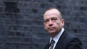 epa10481666 British Secretary of State for Northern Ireland Chris Heaton-Harris arrives at 10 Downing Street for a cabinet meeting, in London, Britain, 21 February  2023.  EPA/ANDY RAIN