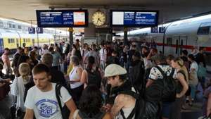 epa13107132 Passengers are stranded at Hanover Central Station in Germany, 12 July 2026, after major delays and cancellations hit a key rail line to Berlin.  EPA/FADI YOUSEF