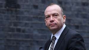 epa10481666 British Secretary of State for Northern Ireland Chris Heaton-Harris arrives at 10 Downing Street for a cabinet meeting, in London, Britain, 21 February  2023.  EPA/ANDY RAIN