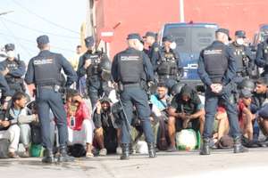 epa13236205 The Spanish National Police transfer hundreds of migrants who had been sleeping on the street to a new location consisting of several tents, aiming to prevent them from continuing to sleep outdoors, in Ceuta, Spain, 13 September 2026. Police sources said that the transfer has been underway since early this morning, moving people from the Loma Colmenar site to tents set up next to the old Los Rosales prison.  EPA/Reduan