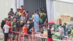 epa13216496 Relocated migrants gather outside a temporary center set up on the Loma Colmenar esplanade in Ceuta, Spain, 06 September 2026. Ceuta President Juan Jesus Vivas is expected to meet European Commissioners Magnus Brunner and Dubravka Suica and European Parliament President Roberta Metsola in Brussels on 08 September to discuss the migration crisis. Thousands of people crossed from Morocco into the Spanish North African enclave in late July 2026.  EPA/REDUAN