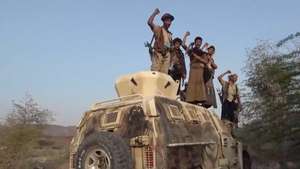 epa13237567 A screen grab taken from an undated handout video released on 13 September 2026 by the Houthi military media center shows Houthi fighters gesturing on an armored personnel carrier during an offensive in the port city of Mokha, western coast of Yemen. Yemen's Saudi-backed government accused Iran and its regional allies of supporting the Houthis’ recent offensive, during which the group captured key port areas, including Mokha, and seized control of strategic maritime positions along the Bab al-Mandab Strait.  EPA/HOUTHI MILITARY MEDIA CENTER HANDOUT HANDOUT EDITORIAL USE ONLY/NO SALES