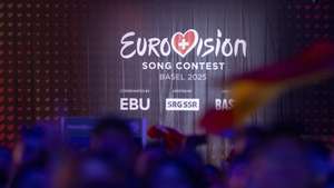 epa12111023 People watch a broadcast in the Eurovision Village during the grand final of the 69th Eurovision Song Contest (ESC) in Basel, Switzerland, 17 May 2025.  EPA/PETER SCHNEIDER