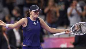 epa10285158 Iga Swiatek of Poland reacts to defeating Caroline Garcia of France during their round robin match of the WTA Finals held at Dickies Arena in Fort Worth, Texas, USA, 03 November 2022. The WTA Finals run through 08 November 2022.  EPA/CJ GUNTHER