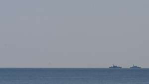 epa09256689 Warships carry out search operations to find the site of a crashed MiG-29 fighter jet in the Black Sea near the town of Shabla, Bulgaria, 09 June 2021. During a training task over the sea area of the Republic of Bulgaria during the tactical exercise with combat fire 'Shabla 21', a MiG-29 aircraft of the Bulgarian Air Force lost radio contact and disappeared from radar. A search and rescue operation was launched immediately and is ongoing. It involves forces and assets from the Navy, the Joint Special Operations Command, the Border Police and the Air Force.  EPA/VASSIL DONEV