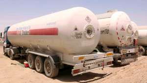 epa10677218 Trucks carrying Liquefied petroleum gas (LPG) imports wait for clearance at the Pak-Afghanistan border in Chaman, Pakistan, 07 June 2023. Pakistan has authorized barter trade with Iran, Afghanistan, and Russia, allowing Pakistani traders to export 26 commodities in exchange for imports of crude oil, industrial machinery, and other goods, the Ministry of Commerce said. The move is an attempt to ease pressure on Pakistan's foreign reserves amid a balance of payments crisis and rising inflation.  EPA/AKHTER GULFAM