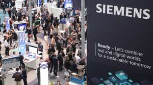 epa09986057 The Siemens booth at the Hannover Industry fair (Hannover Messe) in Hannover, Germany, 30 May 2022. About 2.500 exhibitors are expected for Germany’s biggest fair which opens on 30 May. Partner country in 2022 is Portugal.  EPA/FOCKE STRANGMANN