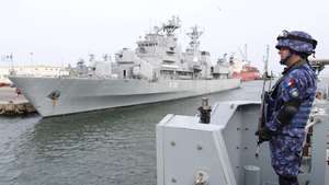 epaselect epa11282808 A Romanian navy under-officer from the Romanian Navy minesweeper M 270 'Sublieutenant Ion Ghiculescu' monitors the sea for potential targets during a NATO naval drill 'Sea Shield 24' on the Black Sea, off the coast of Constanta, Romania, 16 April 2024. 'Sea Shield 24' is the most complex drill conducted by the Romanian Naval Forces in 2024, being carried out with the participation of military and technical personnel from 12 allied and partner states - Bulgaria, France, Georgia, Greece, Italy, Britain, Moldova, the Netherlands, Poland, Portugal, Turkey and the US. More than 2,200 military and approximately 140 technical means (sea and river vessels, aircraft and motor vehicles and boats) are training in the Black Sea, as well as in the coastal area, on the Danube and in the Danube Delta, for combat illegal activities missions, maritime and river control missions, search and rescue at sea, providing assistance to a ship in distress and ensuring the security of NATO's Eastern flank.  EPA/ROBERT GHEMENT