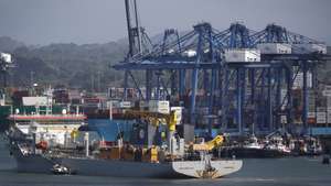 epa11853435 View of a cargo ship in the Panama Canal in Panama City, Panama, 24 January 2025 (Issued 25 January 2025). Panama's five main ports are in the adjacent areas of the interoceanic canal, which US President Donald Trump stated his intention to 'retake' control of the waterway, alleging Chinese interference in its operation, which has been flatly rejected by the Panamanian government.  EPA/Bienvenido Velasco
