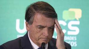 epa10147732 Jair Bolsonaro, current president of Brazil and candidate of the Liberal Party (PL), participates in the debate 'Dialogue with Presidential candidates of the Republic', promoted by the National Union of Entities of Trade and Services (UNECS), in Brasilia, Brazil, 30 August 2022. The elections in Brazil will be held next 02 October and if no candidate obtains 50 percent of the valid votes, a second round will be held on 30 October 2022.  EPA/Joedson Alves