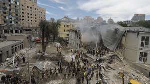 epa11466553 Ukrainians working at the site of a rocket strike on the 'Okhmadyt' children's hospital in Kyiv, Ukraine, 08 July 2024 amid the undoing Russian invasion. Russia massively attacked Ukraine with missiles 08 July, striking Kyiv, Dnipro, Kryvyi Rih, Sloviansk and Kramatorsk. More than 40 missiles of different types were launched, striking residential buildings, infrastructure and the children's hospital. At least seven people were killed and 25 injured as result of shelling in Kyiv according to the State Emergency Service report.  EPA/SERGEY DOLZHENKO