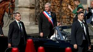 epa12814598 Chilean President Jose Antonio Kast (C) arrives by car at the Metropolitan Cathedral to attend Mass and a 'Prayer for the People of Chile and the New Government' in Santiago, Chile, 12 March 2026.  EPA/AILEN DIAZ