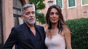 epa10831909 US actor George Clooney (L) and his wife Amal Alamuddin arrive to attend the ceremony for the Diane Von Furstenberg Award (DVF), in the Sala degli Arazzi of the Giorgio Cini Foundation in Venice, Italy, 31 August 2023. The DVF Award coincides with the 80th annual Venice International Film Festival running from 30 August to 09 September 2023. Diane Von Furstenberg is a Belgian fashion designer who founded the DVF Awards in 2010 to recognize and support extraordinary women.  EPA/ANDREA MEROLA