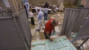 epa12967374 People vote at a polling station in Cordoba, Andalusia, Spain on 17 May 2026. More than 6.8 million people are eligible to vote in the regional elections.  EPA/SALAS