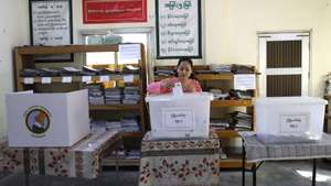 epa12612801 A Myanmar voter casts a ballot during early voting of the general election in Naypyitaw, Myanmar, 26 December 2025. Myanmar's military government, the State Administration Council (SAC), plans to hold its first national vote since the February 2021 coup in a multi-stage general election, with the first phase set for 28 December 2025 and the second for 11 January 2026. Over 50 political parties have registered to participate in the election, according to the Union Election Commission (UEC), while the main pro-democracy opposition, the National League for Democracy (NLD), has been dissolved since March 2023.  EPA/RUNGROJ YONGRIT