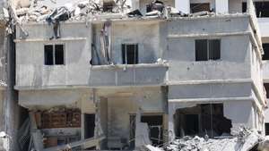 epa13010699 Destroyed buildings after an Israeli airstrike that targeted the city of Tyre, Lebanon, 02 June 2026. The Lebanese Ministry of Health said that, as of 01 June, Israeli attacks across Lebanon have killed more than 3,435 people and injured more than 10,400, since renewed hostilities between Israel and Hezbollah began.  EPA/WAEL HAMZEH