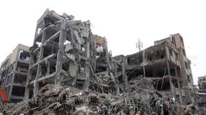 epaselect epa12813893 A view of damaged residential buildings in central Tehran, Iran, 12 March 2026. A joint Israeli and US military operation continues to target multiple locations across Iran since the early hours of 28 February 2026.  EPA/ABEDIN TAHERKENAREH