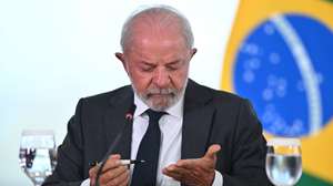 epa12878891 Brazilian President Luiz Inacio Lula da Silva reacts after signing a bill criminalizing vicarious violence in Brasilia, Brazil, 09 April 2026. The penalties under the new law range from 20 to 40 years in prison.  EPA/ANDRE BORGES