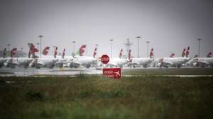 epa08524024 TAP Air Portugal aircraft grounded at Humberto Delgado airport closed for passenger traffic as part of the exceptional traffic measures to combat the epidemiological situation of Covid-19, in Lisbon, Portugal, 09 April 2020 (reissued 02 July 2020). The granting of state support to TAP has been under discussion since the airline&#039;s activity came to a standstill because of the coronavirus pandemic, with an agreed injection of up to 1,200 million euros.  EPA/MARIO CRUZ