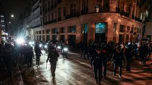 epa10721755 Riot police forces secure the area near the Arc de triomphe amid fears of another night of clashes with protestors in Paris, France, 01 July 2023. Violence broke out all over France after police fatally shot a 17-year-old teenager during a traffic stop in Nanterre on 27 June.  EPA/MOHAMMED BADRA