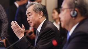 epa10743223 China's top diplomat Wang Yi (L) speaks during the Association of Southeast Asian Nations (ASEAN) Plus Three Foreign Ministers' Meeting in Jakarta, Indonesia, 13 July 2023. Indonesia is hosting the 56th ASEAN foreign ministers' meeting and related meetings from 08 to 14 July.  EPA/MAST IRHAM / POOL