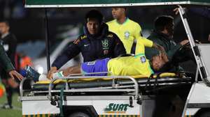 epaselect epa10924731 Brazil's Neymar reacts while being assisted to leave the field for a possible injury during a CONMEBOL FIFA World Cup 2026 qualifier soccer match between Uruguay and Brazil at Centenario stadium in Montevideo, Uruguay, 17 October 2023.  EPA/Raul Martinez