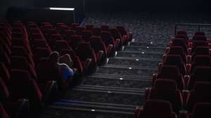 epa08289915 A sole spectator watches a film at a movie theatre in Budapest, Hungary, 12 March 2020. Effective of 12 March, cinemas are restricted to sell a maximum of 99 tickets for a show as on the previous day the Hungarian government declared a state of emergency in response to the novel coronavirus, and prohibited all indoor events with more than 100 participants and outdoor events attended by more than 500 participants. Three more cases have emerged in Hungary on 12 March 2020, bringing the number of confirmed cases of Covid-19 in the country to 16, including nine Iranian, six Hungarian and one British citizens.  EPA/Marton Monus HUNGARY OUT