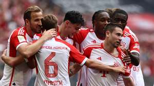 epa11276582 Munich&#039;s Raphael Guerreiro (R) celebrates with teammates after scoring the 1-0 lead during the German Bundesliga soccer match between FC Bayern Munich and 1. FC Cologne in Munich, Germany, 13 April 2024.  EPA/ANNA SZILAGYI CONDITIONS - ATTENTION: The DFL regulations prohibit any use of photographs as image sequences and/or quasi-video.