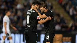 Sporting's players Pedro Goncalves (L) and Daniel Braganca celebrate a goal during the Portuguese First League soccer match between FC Famalicao and Sporting in Vila Nova de Famalicao, Portugal, 16 april 2024. ESTELA SILVA/LUSA