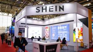 epa11000490 A man walks next to a Shein booth during the China International Supply Chain Expo in Beijing, China, 29 November 2023. China is holding its first China International Supply Chain Expo in Beijing from 28 November to 02 December with the theme of &#039;Connecting the World for a Shared Future&#039;.  EPA/MARK R. CRISTINO