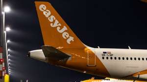 epa08790164 EasyJet airplanes stand at the terminal one during airport apron tour on the occasion of the first arrival at BER Berlin Brandenburg Airport in Schoenefeld, Germany, 31 October 2020. Berlin&#039;s new airport finally opened after nine years of delay.  EPA/HAYOUNG JEON