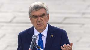 epa11524501 President of the International Olympic Committee Thomas Bach delivers a speech during the interreligious meeting in Paris, France, 04 August 2024. On the occasion of the Paris 2024 Olympic Games and commemorating the interfaith ceremony that took place at the last Paris Games in 1924, representatives of the five religions met on the forecourt of Notre Dame de Paris Cathedral.  EPA/ANDRE PAIN