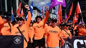 epa11320851 Members of the Construction, Forestry and Maritime Employees Union (CFMEU) and other people participate in a march as part of Labour Day celebrations in Brisbane, Australia 06 May 2024. Labour Day celebrations, organised by Queensland Unions, invites union members and their families to gather with their union and celebrate the ongoing achievements of Queensland workers and the strength of their unions.  EPA/DARREN ENGLAND AUSTRALIA AND NEW ZEALAND OUT