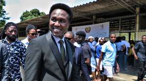 Presidential candidate Venancio Mondlane (C), supported by Podemos, before casting his vote at a polling station in Maputo, Mozambique, 09 October 2024. More than 17.1 million Mozambican voters will choose the President of the Republic, provincial assemblies and their governors, and 250 members of the Assembly of the Republic. The National Elections Commission (CNE) approved lists of 35 political parties running for the Assembly of the Republic and 14 political parties and groups of citizen voters for provincial assemblies. LUISA NHANTUMBO/LUSA