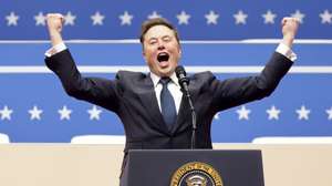 epaselect epa11840264 Tesla CEO Elon Musk gestures to the crowds at the Capitol One Arena as he takes the stage during inauguration ceremonies for US President Donald Trump in Washington, DC, USA, 20 January 2025. Trump was sworn in for a second term as president of the United States on 20 January. The presidential inauguration was held indoors due to extreme cold temperatures in DC.  EPA/ALLISON DINNER